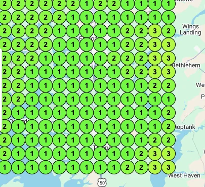 Google Maps rank grid for the keyword dumpster rental: 169 measurement points across Talbot County, almost all showing rank 1 or 2